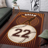 Living room floor setting featuring a retro brown striped baseball batter athletic area rug