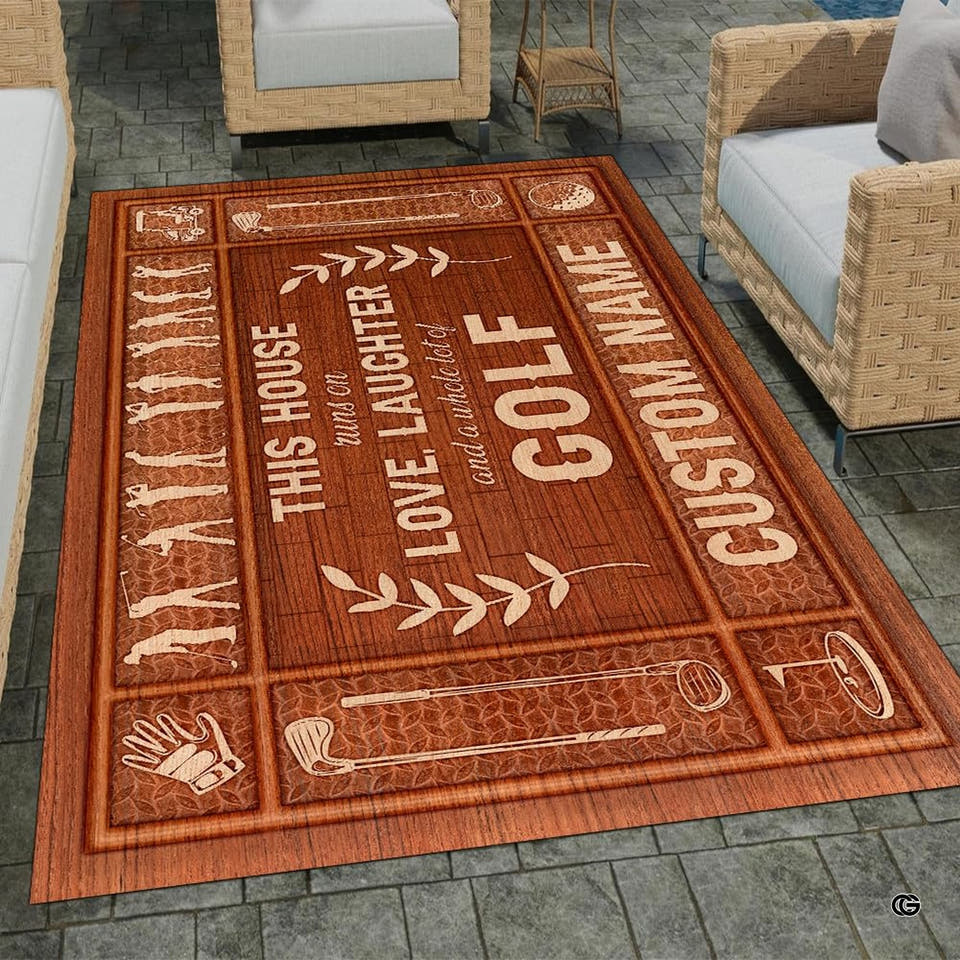 Patio setting with wicker seating displaying the rectangular fairway themed wood plank area rug on stone tiles.