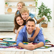 Anti-slip dot backing and clean hemmed edge stitching on watercolor octopus rug - thumbnail image 4 of 7