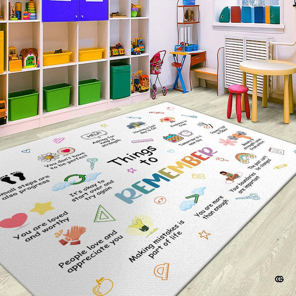 Classroom Area Rug with colorful educational doodles, smiling flowers, and school supplies on a crisp white surface.