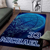 Dissolving neon cyan basketball breaking into digital particles rectangular area rug.