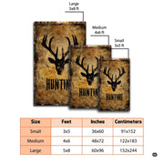 Detailed view of weathered black and mustard sepia tones on the distressed stag rug motif. - thumbnail image 2 of 7