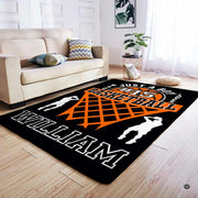 Sports themed graphic area rug highlighting white dunking silhouettes and bold athletic typography. - thumbnail image 4 of 7