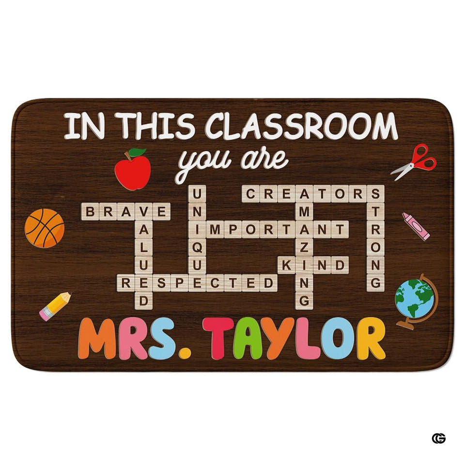Classroom teacher area rug featuring dark wood plank texture, crossword tiles, and school illustrations.
