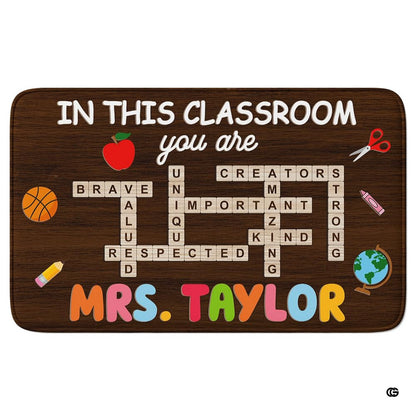 Classroom teacher area rug featuring dark wood plank texture, crossword tiles, and school illustrations. - thumbnail image 1 of 8