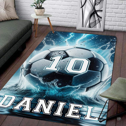 Side perspective showing sharp contrast and vivid oceanic graphics across an athletic soccer motif rug. - thumbnail image 7 of 8