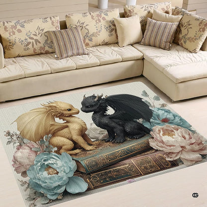 Cute golden and black baby dragons sitting on an antique leather book surrounded by soft pastel peonies area rug. - thumbnail image 1 of 5