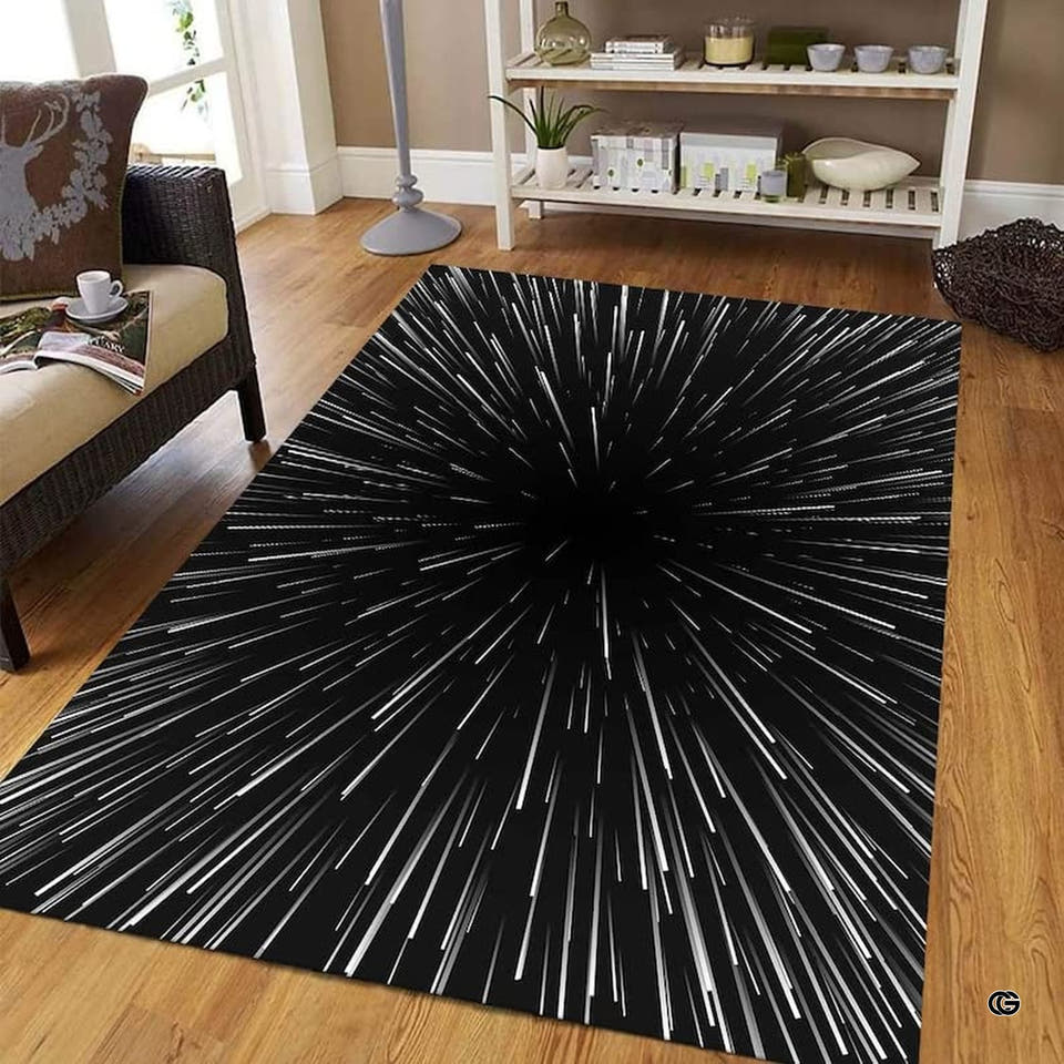 Monochromatic optical illusion classroom area rug showing radiating white streaks in a warp speed tunnel pattern on black.