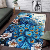 Ornate peacock area rug with sapphire plumage, blooming blush flowers, and delicate vines.