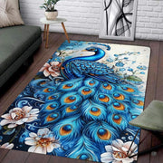 Ornate peacock area rug with sapphire plumage, blooming blush flowers, and delicate vines. - thumbnail image 1 of 8