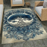 Patio stone lounge with wicker seating displaying the vintage indigo Celtic Tree of Life area rug