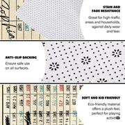 Close-up view of tabular grid columns and multi-colored thematic accent stamps on decorative rug. - thumbnail image 3 of 7