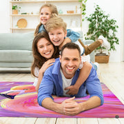 Decorative flamingo design rug paired with minimalist accent furniture and tropical indoor greenery. - thumbnail image 6 of 7