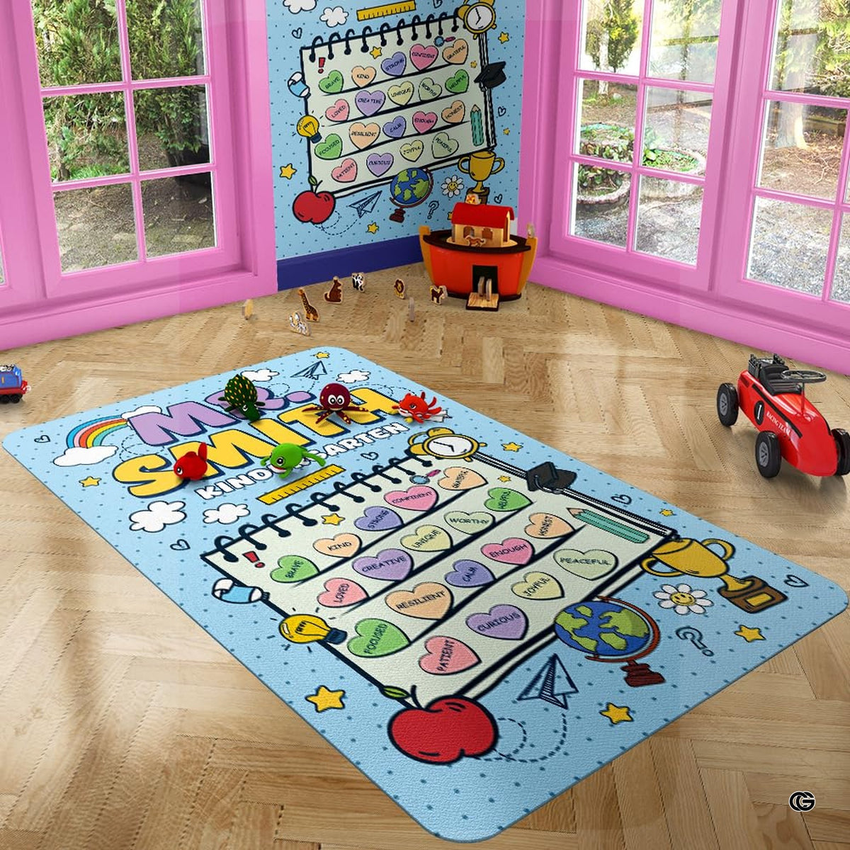 Rubber back area rug design showing dotted blue background and colorful schoolhouse accents