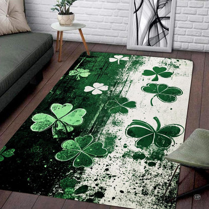 Top view of grunge clover area rug featuring emerald and cream split-tone backdrop with floating shamrocks. - thumbnail image 1 of 8
