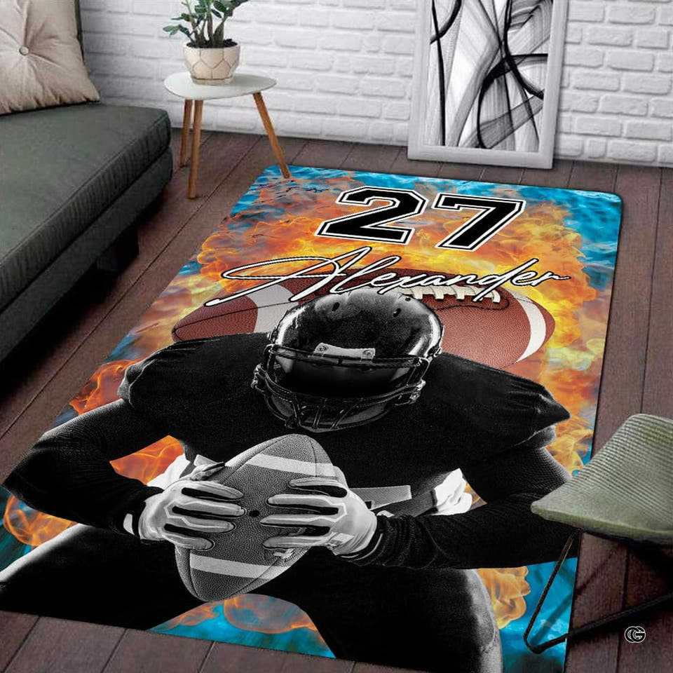 Boys sports theme rug showcasing a football player with orange fire and blue smoke.