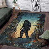 Silhouette area rug featuring Bigfoot walking in a pine forest under stars.
