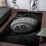 Modern living room floor setting featuring a monochrome baseball glove stitching athletic area rug