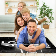 Sports themed hockey rink rug styled beneath contemporary dark living room lounge furniture. - thumbnail image 5 of 7