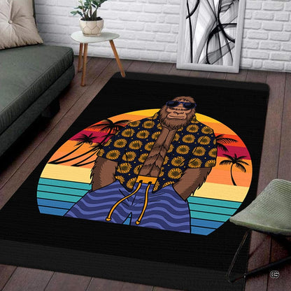 Bigfoot area rug showing cartoon Sasquatch in sunglasses against a striped sunset in a tropical beach living room. - thumbnail image 1 of 5