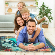 Close-up of nautical sea creatures including an illustrative starfish and colorful coral reef formations on the rug. - thumbnail image 2 of 7