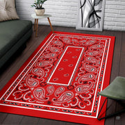 Soft low-pile microfiber fabric and foam cushioning detail of red bandana rug - thumbnail image 3 of 9