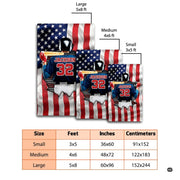 Close perspective of batter holding wooden bat emerging over ripped patriotic flag background. - thumbnail image 2 of 8