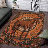 Top-down view of horse area rug with brown horse portrait inside ornate mandala medallion and rust orange scrollwork borders.
