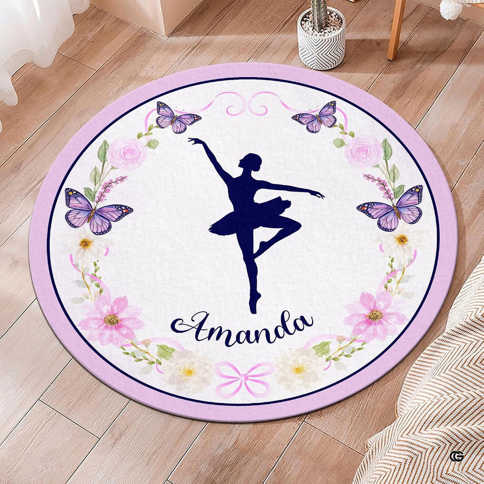 Round ballerina silhouette area rug with watercolor floral wreath on hardwood floor