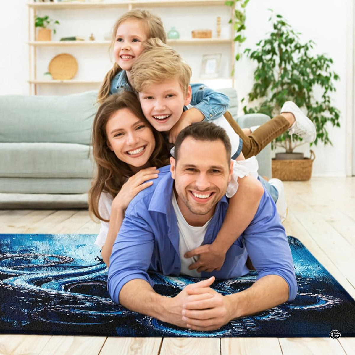 Deep ocean blue octopus area rug styled on hardwood flooring in living room.