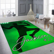 Dynamic soccer player floor accent styled beneath contemporary seating in game space. - thumbnail image 6 of 7