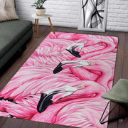 Pink flamingo trio feathers living room area rug in a modern living space - thumbnail image 1 of 7
