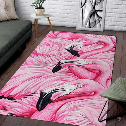 Pink flamingo trio feathers living room area rug in a modern living space - thumbnail image 1 of 7