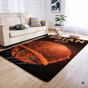 Geometric basketball area rug styled on hardwood floor in modern living room setting. - thumbnail image 4 of 7