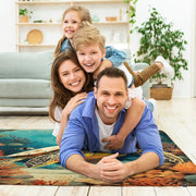 Bright sunroom setting with the golden sea turtle rug laid across light-toned hardwood flooring - thumbnail image 5 of 7