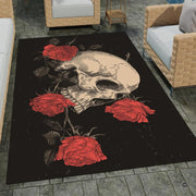 Fireside lounge setting with a person relaxing beside the gothic skull and rose rug - thumbnail image 3 of 8