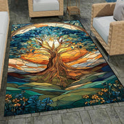 Patio stone lounge with wicker seating displaying the stained glass sunset Tree of Life area rug - thumbnail image 1 of 8