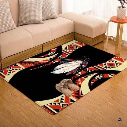 Room setting highlighting decorative beaded feather visuals on a black southwestern area rug. - thumbnail image 7 of 7