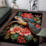 Tropical sea turtle area rug showing detailed shell patterns and red hibiscus flowers decorative accent dark backdrop.
