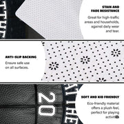 Angled view showing dark charcoal wood plank texture graphic across a sports themed bedroom area rug. - thumbnail image 6 of 7