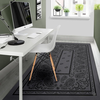 Cozy modern living room arrangement styling the dark charcoal bandana paisley rug - thumbnail image 5 of 9