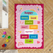 Pink scalloped frame area rug showcasing positive affirmations across multi-colored game blocks. - thumbnail image 8 of 9