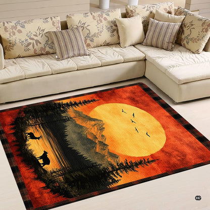 Close-up detail of plaid border and sunset mountain wildlife print on rustic area rug. - thumbnail image 4 of 5