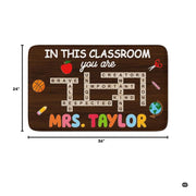 Educational floor decor displaying scissors, pencil, crayon, and crossword letter motif on wood planks. - thumbnail image 3 of 8