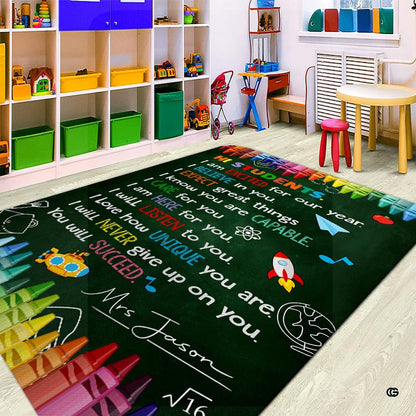Educational area rug detail displaying vibrant crayon borders and playful scholastic illustrations. - thumbnail image 3 of 7