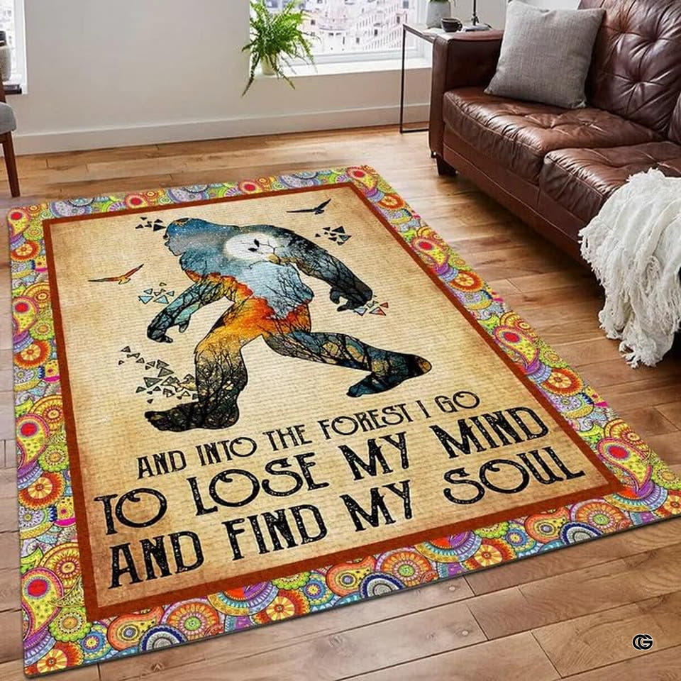 Rectangular Bigfoot cabin area rugs featuring woodland landscape silhouette and colorful bohemian mandala border.