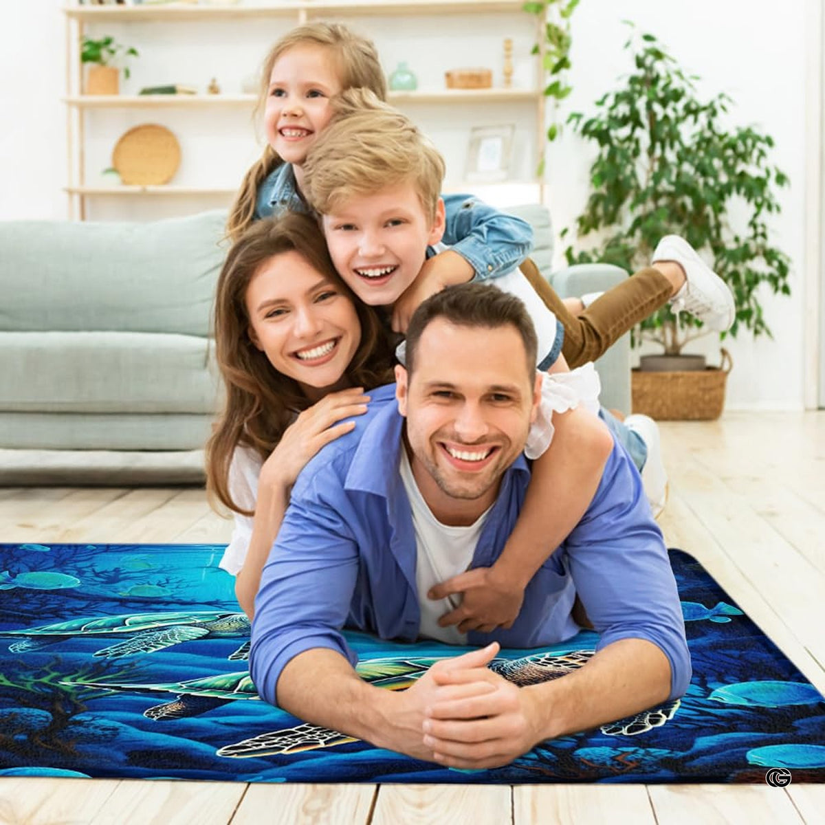 Bright sunroom setting with the swimming sea turtles rug centered on wood flooring - image 5 of 7