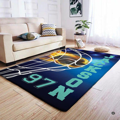 Jersey numeral graphic and fiery arena beam detail on an action hockey rink rug. - thumbnail image 4 of 7