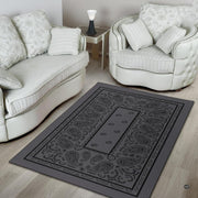 Non-slip rubber backing and bound edge stitching on charcoal bandana rug - thumbnail image 4 of 9