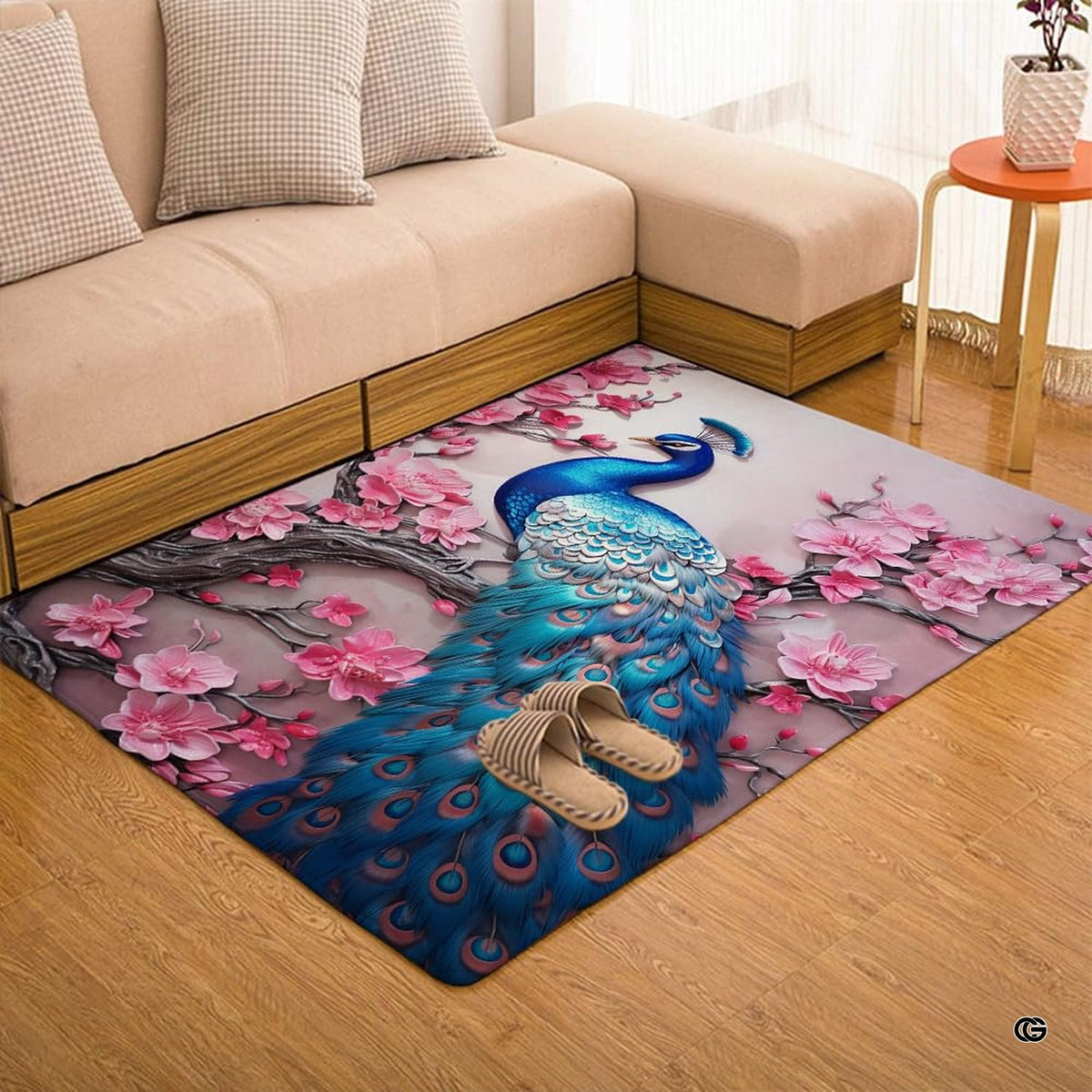 Angle view of peacock teal area rug illustrating rich turquoise hues and decorative cherry blossom branch patterns.